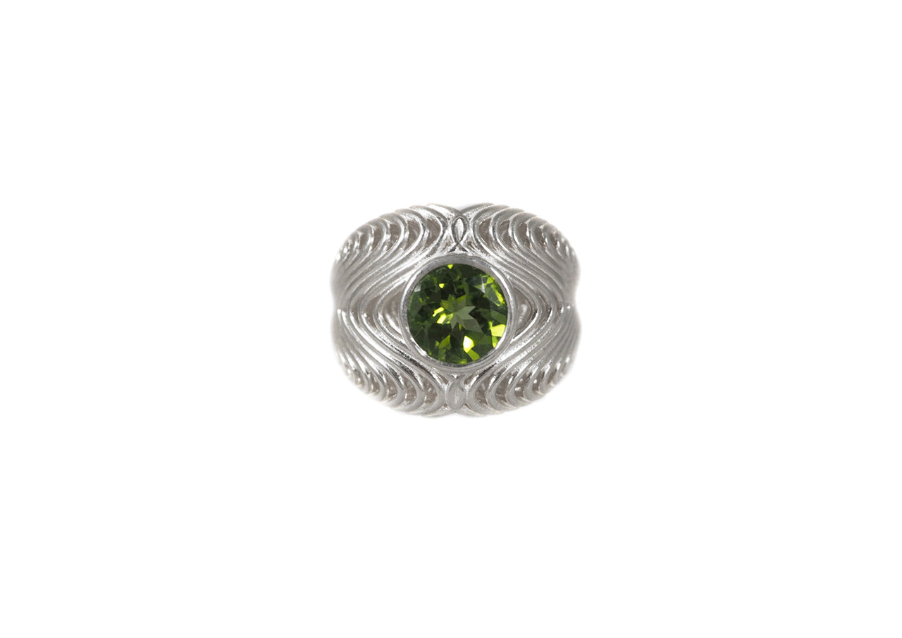 Harmonic Peridot Statement Ring