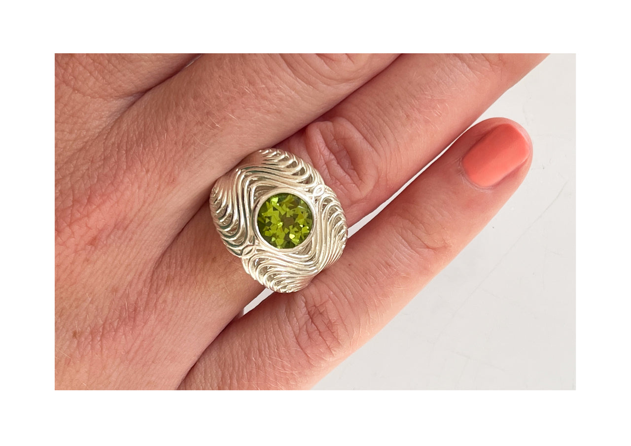 Harmonic Peridot Statement Ring