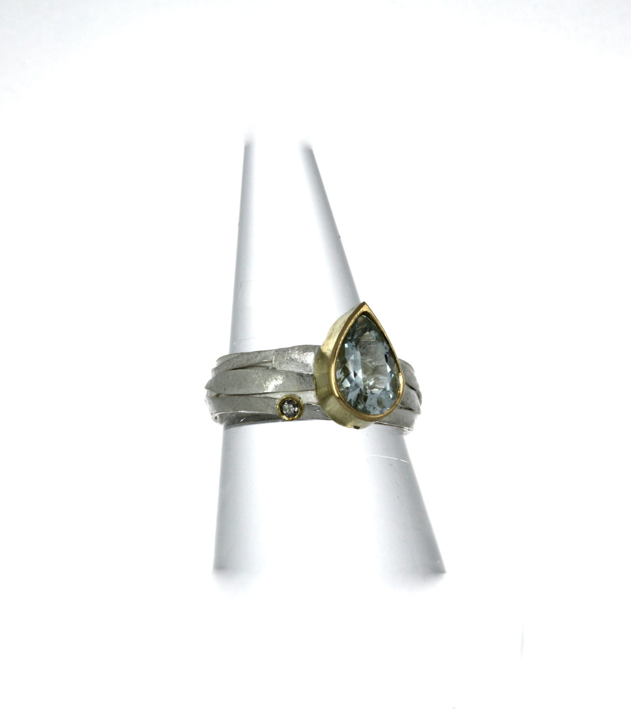 Silver wrap ring with aquamarine and diamond