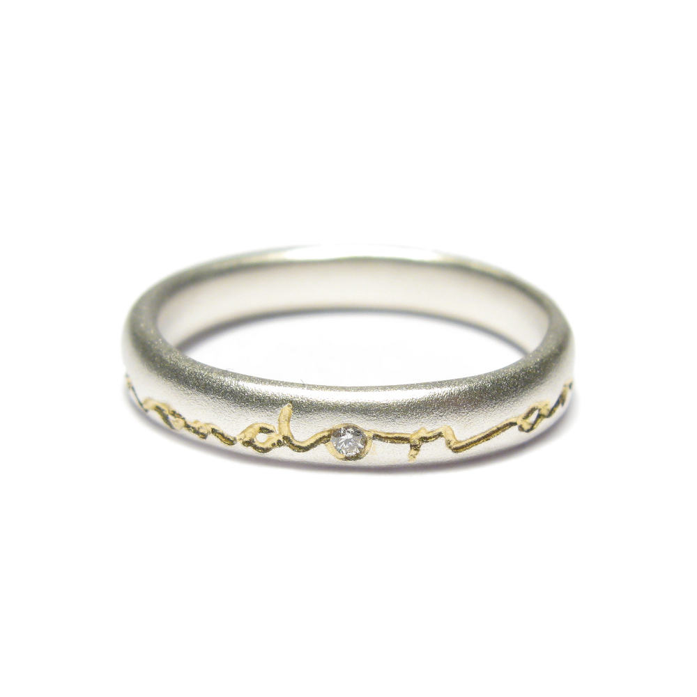 'on and on' etched ring with diamond